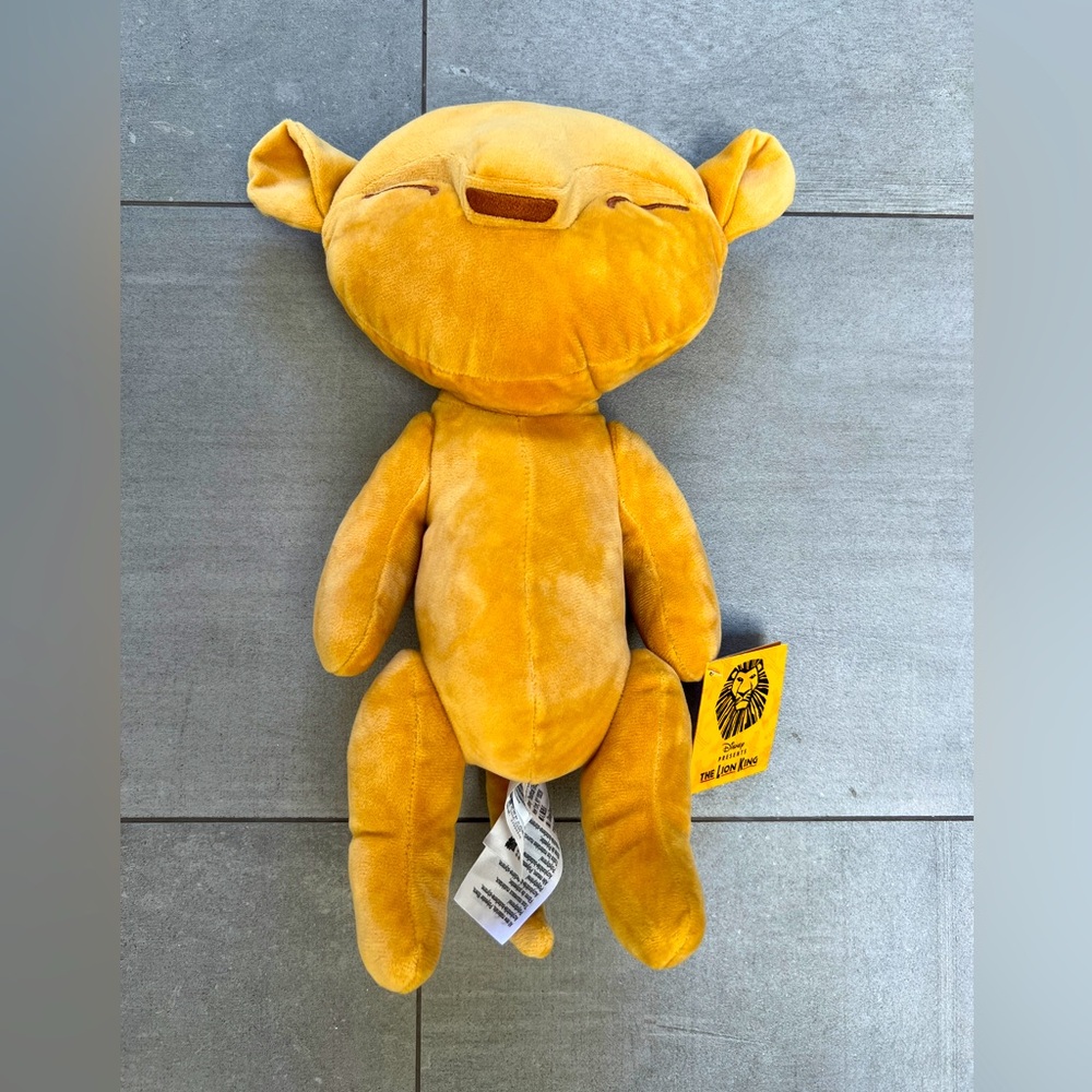 NWT 15” The Lion King Toy - plush golden color w moving arms/legs.